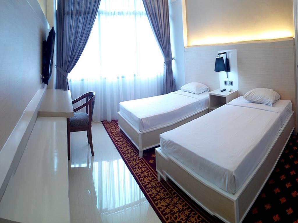 Hotel Sandjaja Палембанг Стая снимка